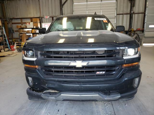 Photo 5 from auction – 2018 CHEVROLET SILVERADO with VIN 3GCUKREC6JG578152