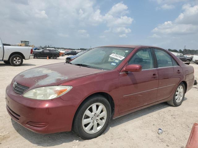 TOYOTA CAMRY LE 2002 with VIN 4T1BF30K92U002010 - Photo from auction