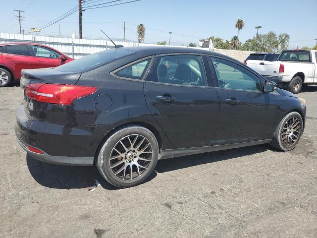 Photo 3 from auction – 2015 FORD FOCUS SE with VIN 1FADP3F20FL343556