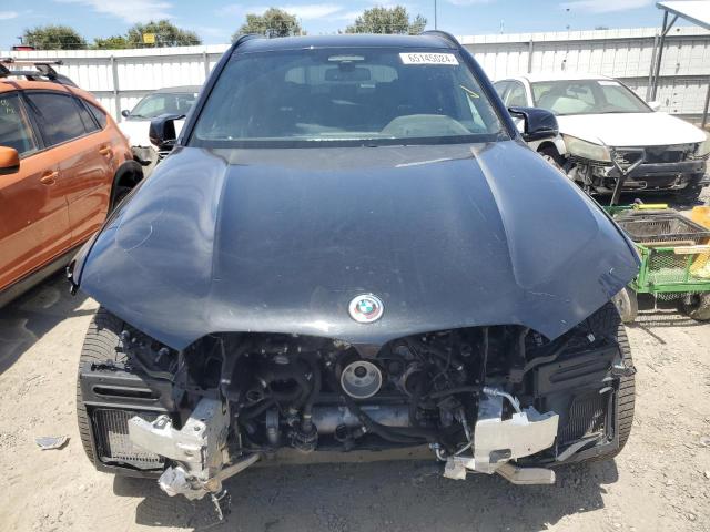 Photo 5 from auction – 2022 BMW X5 M with VIN 5YMJU0C02N9M28005