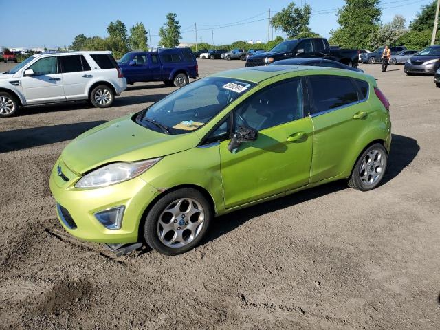 FORD FIESTA SES 2012 with VIN 3FADP4FJ9CM124747 - Photo from auction