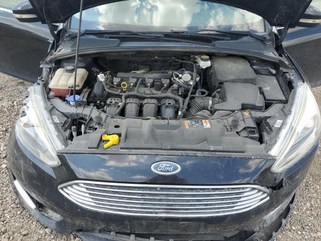Photo 11 from auction – 2017 FORD FOCUS TITA with VIN 1FADP3N29HL320586