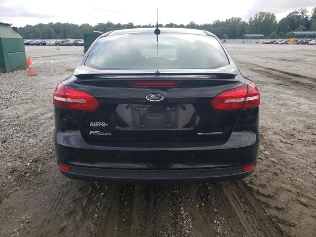 Photo 6 from auction – 2016 FORD FOCUS TITA with VIN 1FADP3J29GL248762