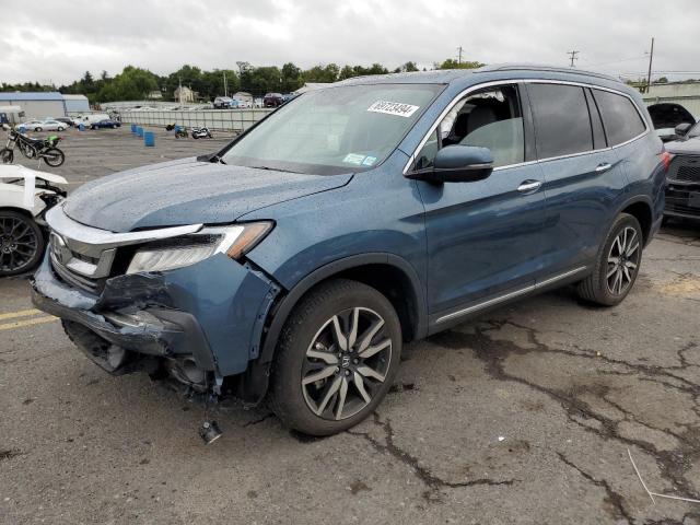 Photo 1 from auction – 2022 HONDA PILOT TOUR with VIN 5FNYF6H93NB002759