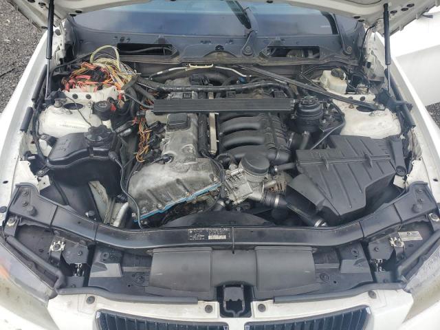 Photo 11 from auction – 2006 BMW 325 I with VIN WBAVB13506KX43295