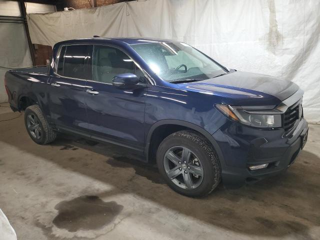 Photo 4 from auction – 2023 HONDA RIDGELINE with VIN 5FPYK3F74PB030463