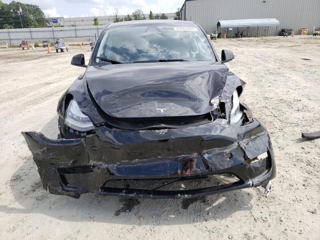 Photo 5 from auction – 2023 TESLA MODEL Y with VIN 7SAYGDEE7PA140911