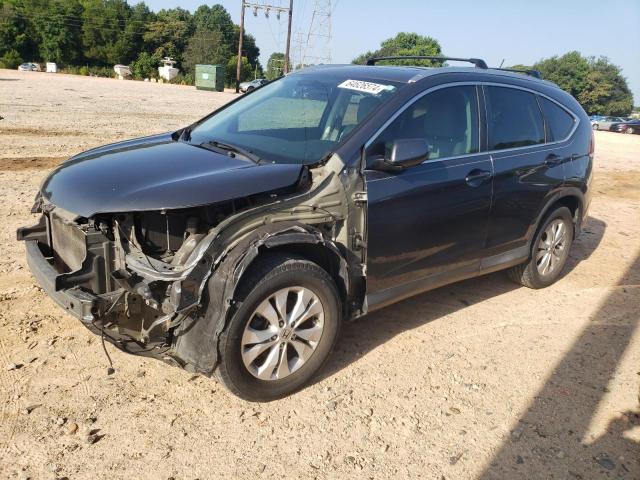 HONDA CR-V EX 2014 with VIN 2HKRM4H58EH690917 - Photo from auction