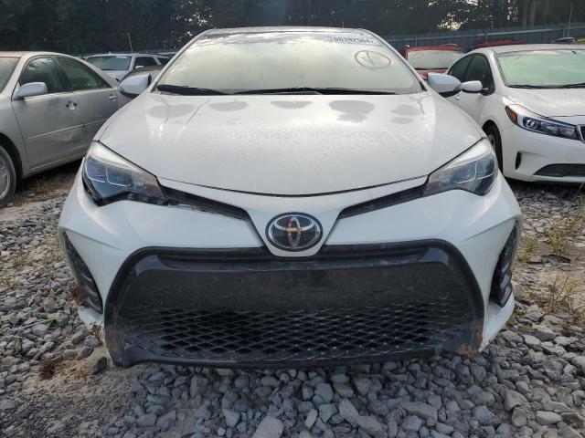 Photo 5 from auction – 2018 TOYOTA COROLLA L with VIN 5YFBURHEXJP810244