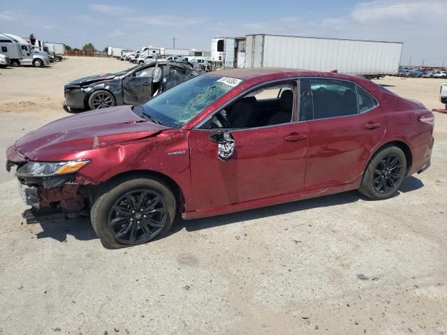 TOYOTA CAMRY LE 2020 with VIN 4T1C31AKXLU522010 - Photo from auction