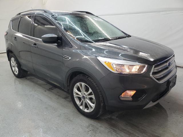 Photo 4 from auction – 2018 FORD ESCAPE SE with VIN 1FMCU0GD4JUC90842