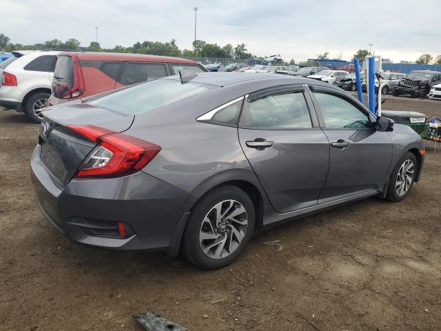 Photo 3 from auction – 2018 HONDA CIVIC EX with VIN 2HGFC2F74JH605123