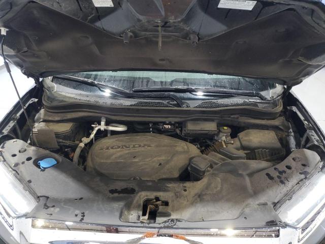 Photo 12 from auction – 2022 HONDA PASSPORT E with VIN 5FNYF8H50NB019348