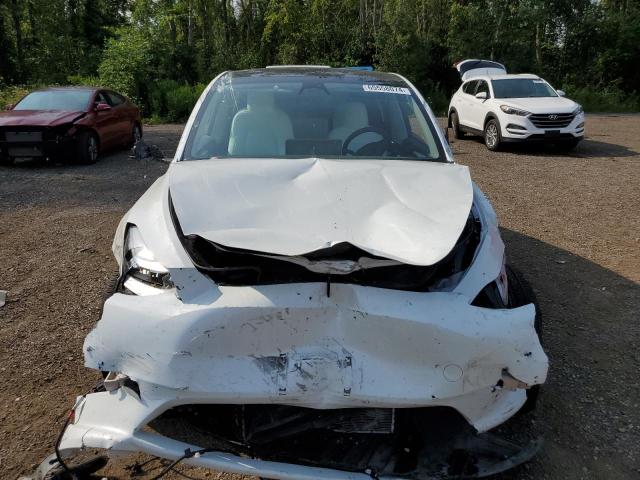 Photo 5 from auction – 2023 TESLA MODEL Y with VIN 7SAYGDEE4PF603140