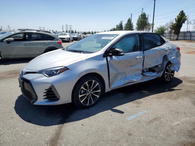 TOYOTA COROLLA L 2017 with VIN 5YFBURHE0HP574861 - Photo from auction