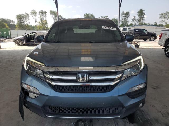 Photo 5 from auction – 2017 HONDA PILOT ELIT with VIN 5FNYF6H06HB024986