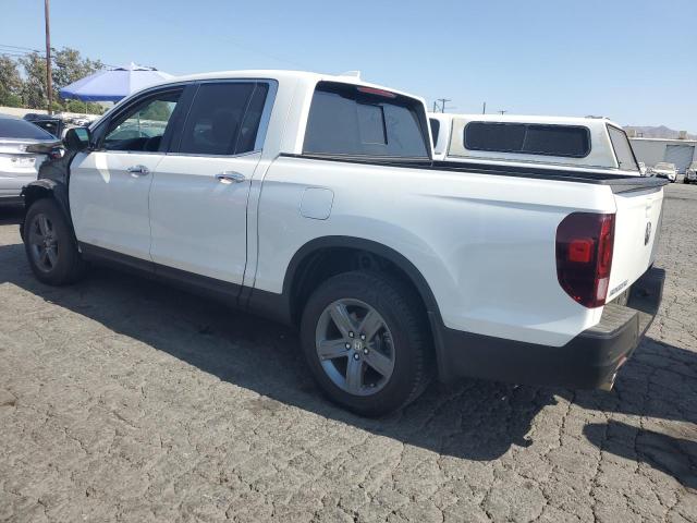 Photo 2 from auction – 2021 HONDA RIDGELINE with VIN 5FPYK3F73MB009311