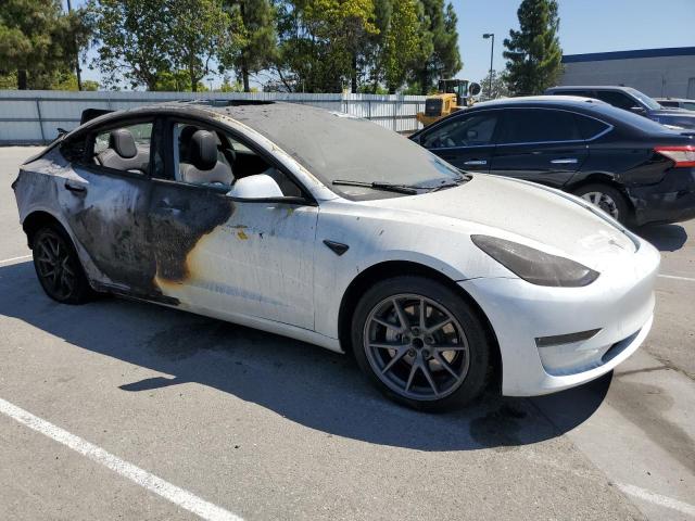 Photo 4 from auction – 2023 TESLA MODEL 3 with VIN 5YJ3E1EA8PF517449