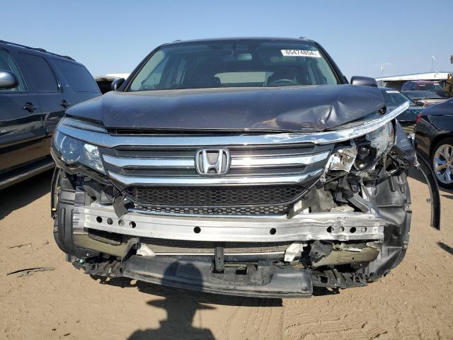 Photo 5 from auction – 2018 HONDA PILOT EXL with VIN 5FNYF6H5XJB067048