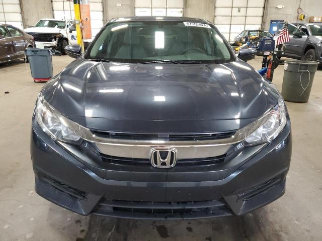 Photo 5 from auction – 2017 HONDA CIVIC LX with VIN 2HGFC2F56HH577432