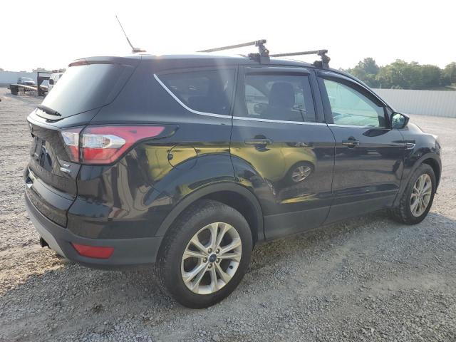 Photo 3 from auction – 2017 FORD ESCAPE SE with VIN 1FMCU9GD0HUD94873