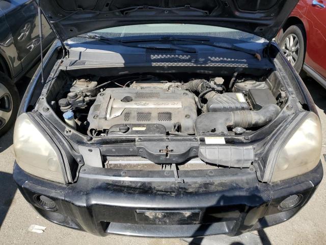 Photo 12 from auction – 2005 HYUNDAI TUCSON with VIN KM8JM12B95U193435