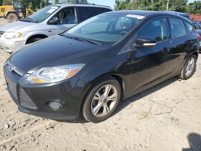 FORD FOCUS SE 2014 with VIN 1FADP3K2XEL369148 - Photo from auction