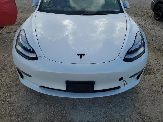 Photo 11 from auction – 2020 TESLA MODEL 3 with VIN 5YJ3E1EA2LF737468