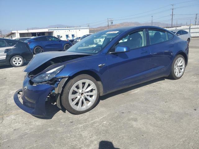 TESLA MODEL 3 2022 with VIN 5YJ3E1EAXNF142693 - Photo from auction