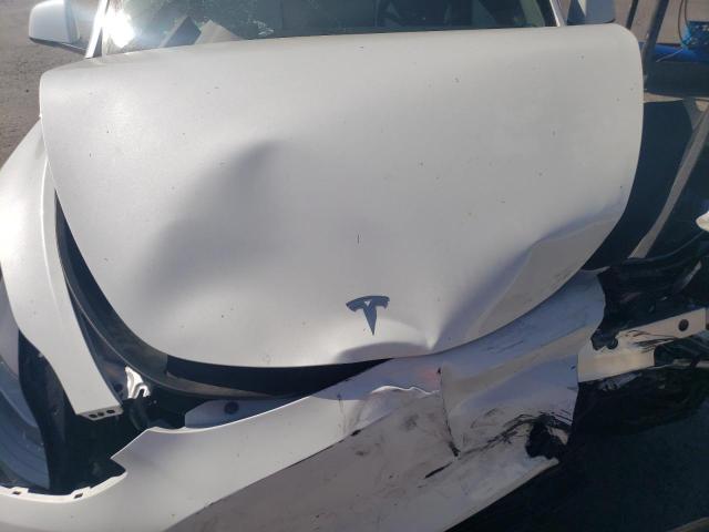 Photo 12 from auction – 2022 TESLA MODEL Y with VIN 7SAYGDEF8NF495109