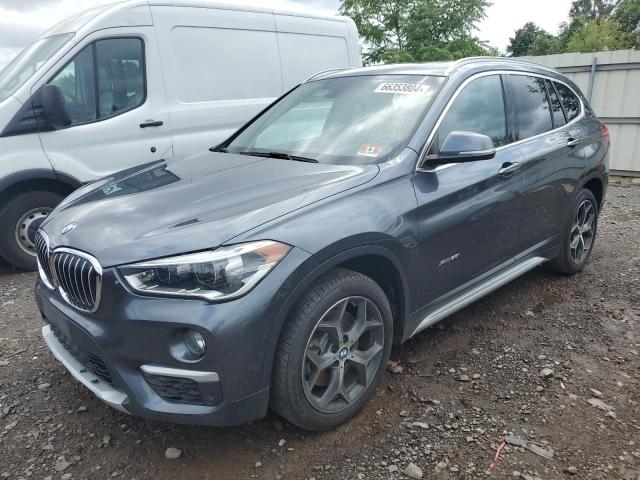 BMW X1 XDRIVE2 2017 with VIN WBXHT3C30H5F80162 - Photo from auction