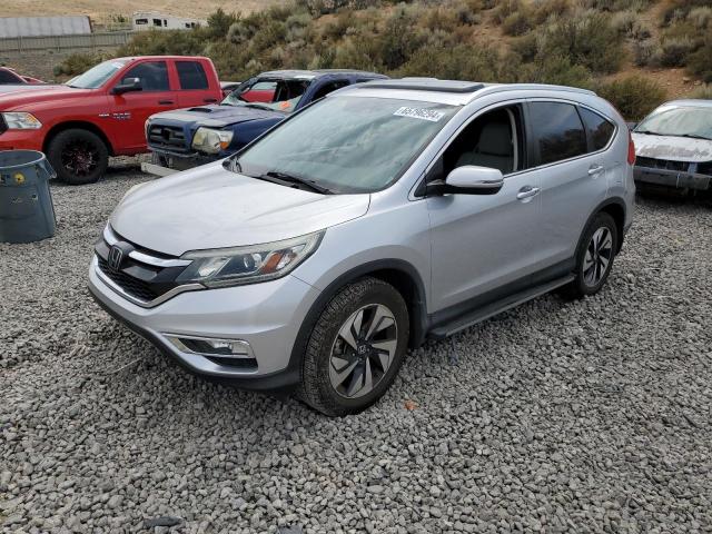 HONDA CR-V TOURI 2016 with VIN 5J6RM4H97GL009433 - Photo from auction