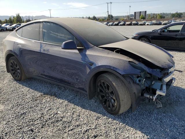 Photo 4 from auction – 2023 TESLA MODEL Y with VIN 7SAYGAEE7PF596165