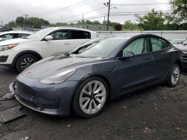 TESLA MODEL 3 2022 with VIN 5YJ3E1EA2NF303148 - Photo from auction