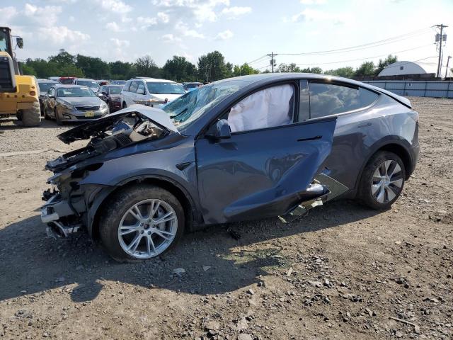 TESLA MODEL Y 2023 with VIN 7SAYGDEE0PF790845 - Photo from auction