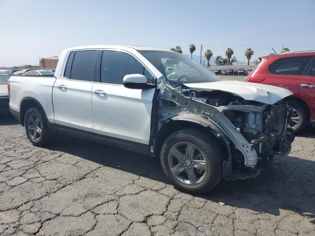 Photo 4 from auction – 2021 HONDA RIDGELINE with VIN 5FPYK3F73MB009311