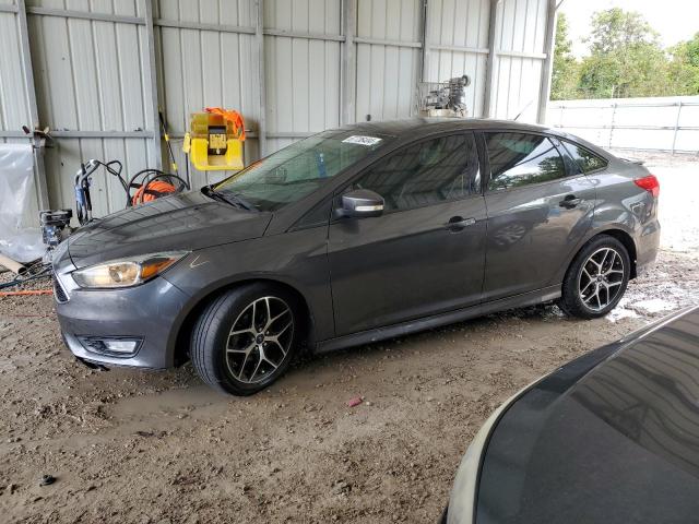FORD FOCUS SE 2015 with VIN 1FADP3F26FL362581 - Photo from auction