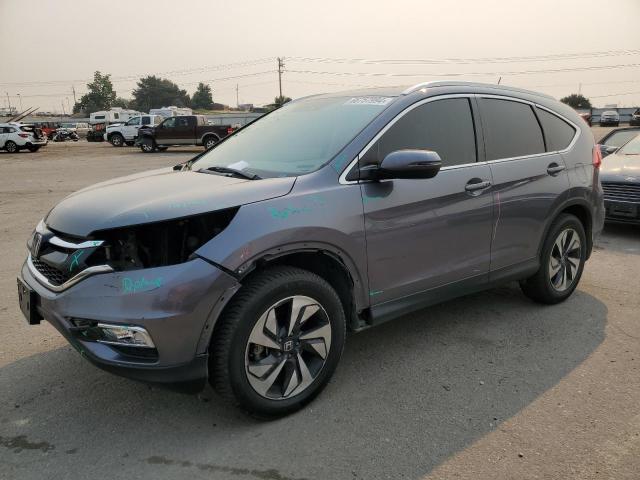 HONDA CR-V TOURI 2016 with VIN 5J6RM4H98GL137583 - Photo from auction