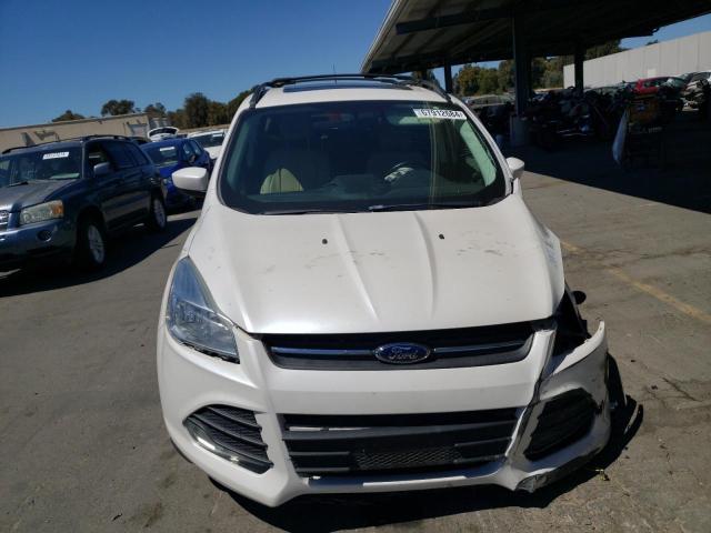 Foto 5 de la subasta – 2015 FORD ESCAPE SE con VIN 1FMCU9G91FUA44094