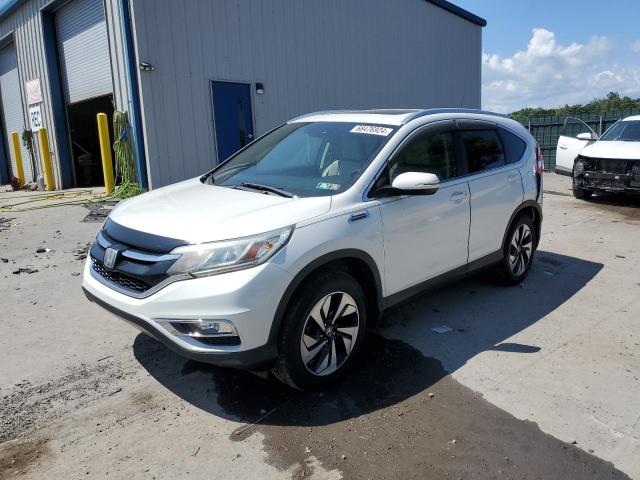 HONDA CR-V TOURI 2015 with VIN 5J6RM4H97FL069677 - Photo from auction