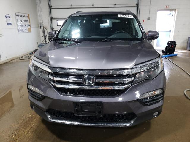 Photo 5 from auction – 2018 HONDA PILOT TOUR with VIN 5FNYF6H94JB033562