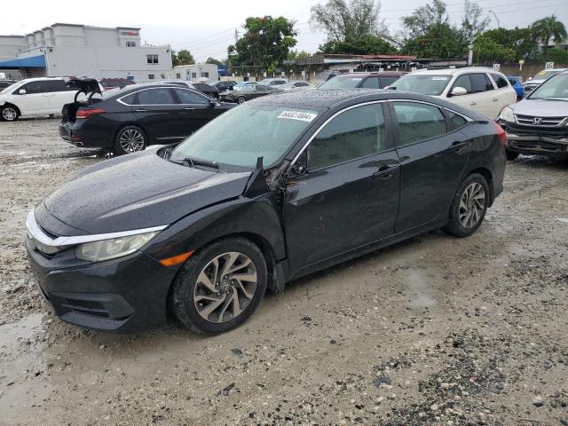 HONDA CIVIC EX 2017 with VIN 19XFC2F75HE056309 - Photo from auction