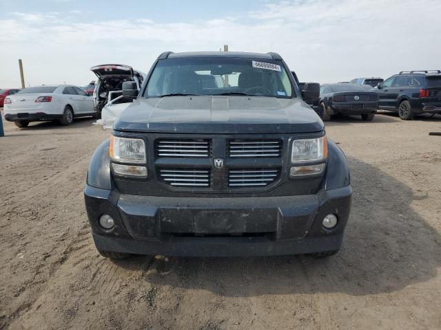 Photo 5 from auction – 2011 DODGE NITRO HEAT with VIN 1D4PT4GK5BW599632