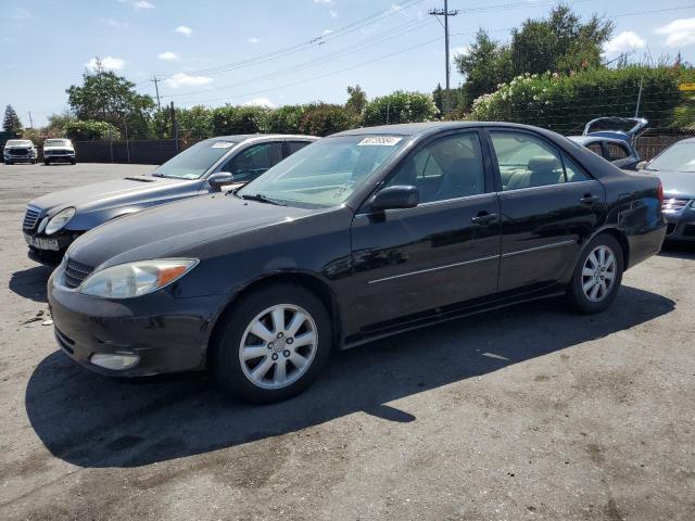 TOYOTA CAMRY LE 2003 with VIN 4T1BF30K43U058907 - Photo from auction