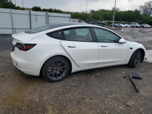 Photo 3 from auction – 2021 TESLA MODEL 3 with VIN 5YJ3E1EA6MF048647