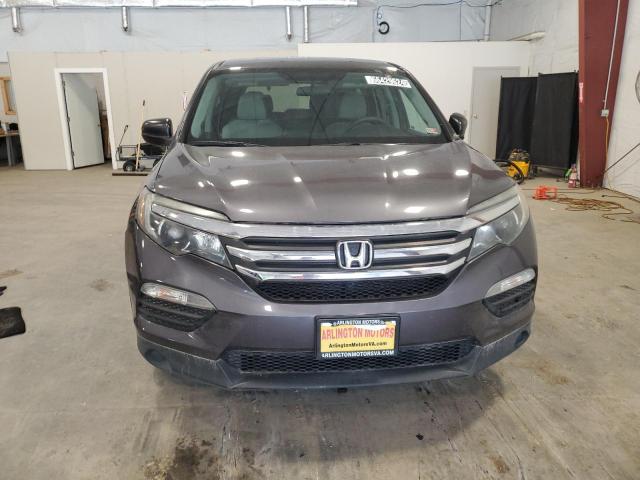 Photo 5 from auction – 2018 HONDA PILOT LX with VIN 5FNYF5H15JB016953
