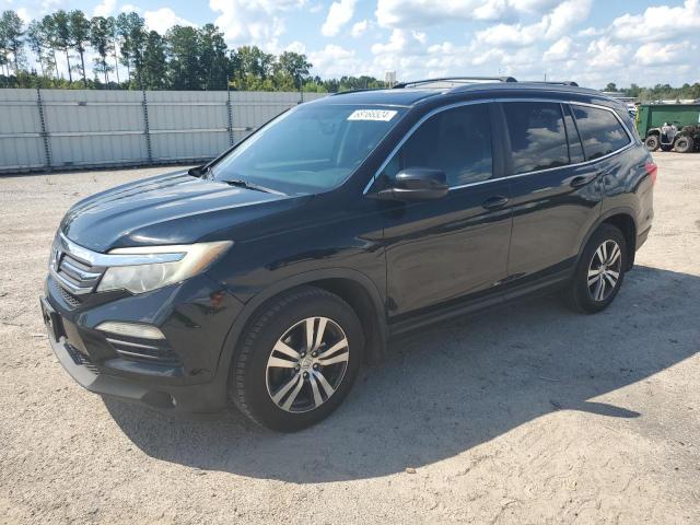 HONDA PILOT EXL 2017 with VIN 5FNYF5H85HB037874 - Photo from auction