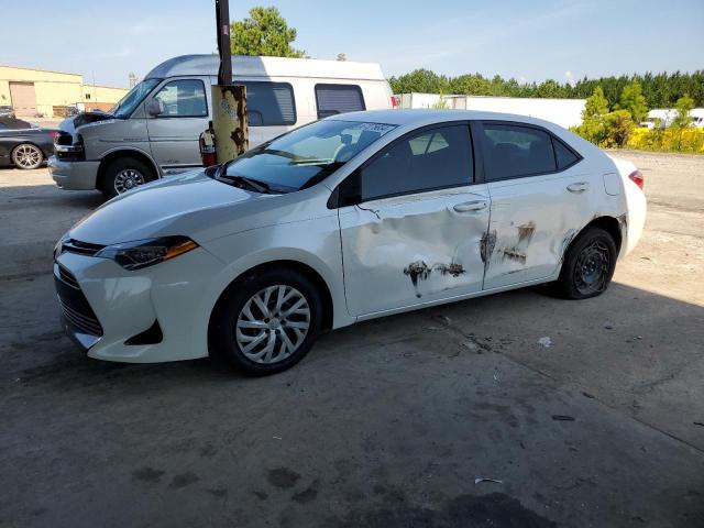 TOYOTA COROLLA L 2018 with VIN 5YFBURHE6JP740841 - Photo from auction