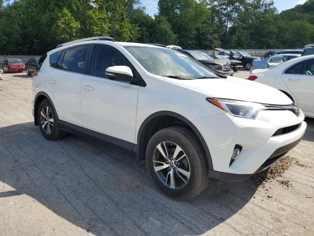 Photo 4 from auction – 2017 TOYOTA RAV4 XLE with VIN JTMRFREV5HJ132062