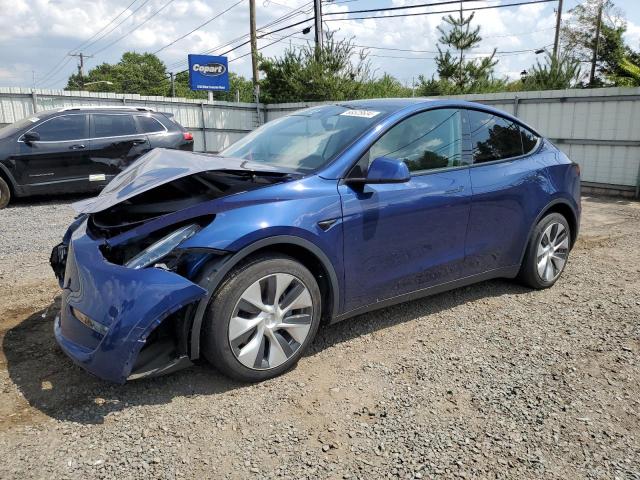 TESLA MODEL Y 2023 with VIN 7SAYGAEEXPF616120 - Photo from auction